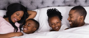 family snuggling on an ericssons mattress